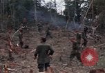 Image of Wrecked US Army UH-1H helicopter A Shau Valley Vietnam, 1968, second 46 stock footage video 65675026858