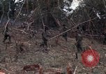 Image of Wrecked US Army UH-1H helicopter A Shau Valley Vietnam, 1968, second 49 stock footage video 65675026858