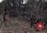 Image of Wrecked US Army UH-1H helicopter A Shau Valley Vietnam, 1968, second 52 stock footage video 65675026858