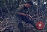 Image of Wrecked US Army UH-1H helicopter A Shau Valley Vietnam, 1968, second 56 stock footage video 65675026858