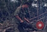 Image of Wrecked US Army UH-1H helicopter A Shau Valley Vietnam, 1968, second 57 stock footage video 65675026858