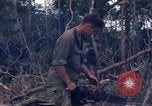 Image of Wrecked US Army UH-1H helicopter A Shau Valley Vietnam, 1968, second 59 stock footage video 65675026858