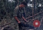 Image of Wrecked US Army UH-1H helicopter A Shau Valley Vietnam, 1968, second 60 stock footage video 65675026858