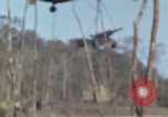 Image of Soldiers struggling to position 105mm Howitzer A Shau Valley Vietnam, 1968, second 8 stock footage video 65675026860