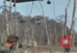 Image of Soldiers struggling to position 105mm Howitzer A Shau Valley Vietnam, 1968, second 11 stock footage video 65675026860