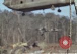 Image of Soldiers struggling to position 105mm Howitzer A Shau Valley Vietnam, 1968, second 14 stock footage video 65675026860