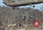 Image of Soldiers struggling to position 105mm Howitzer A Shau Valley Vietnam, 1968, second 15 stock footage video 65675026860
