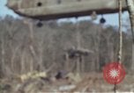 Image of Soldiers struggling to position 105mm Howitzer A Shau Valley Vietnam, 1968, second 17 stock footage video 65675026860