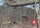Image of Soldiers struggling to position 105mm Howitzer A Shau Valley Vietnam, 1968, second 20 stock footage video 65675026860
