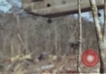 Image of Soldiers struggling to position 105mm Howitzer A Shau Valley Vietnam, 1968, second 21 stock footage video 65675026860