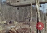 Image of Soldiers struggling to position 105mm Howitzer A Shau Valley Vietnam, 1968, second 23 stock footage video 65675026860