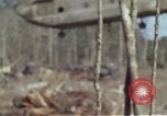Image of Soldiers struggling to position 105mm Howitzer A Shau Valley Vietnam, 1968, second 24 stock footage video 65675026860