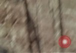 Image of Soldiers struggling to position 105mm Howitzer A Shau Valley Vietnam, 1968, second 31 stock footage video 65675026860