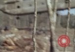 Image of Soldiers struggling to position 105mm Howitzer A Shau Valley Vietnam, 1968, second 32 stock footage video 65675026860