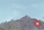 Image of Soldiers struggling to position 105mm Howitzer A Shau Valley Vietnam, 1968, second 37 stock footage video 65675026860