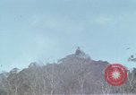 Image of Soldiers struggling to position 105mm Howitzer A Shau Valley Vietnam, 1968, second 38 stock footage video 65675026860