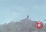 Image of Soldiers struggling to position 105mm Howitzer A Shau Valley Vietnam, 1968, second 40 stock footage video 65675026860