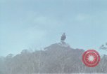 Image of Soldiers struggling to position 105mm Howitzer A Shau Valley Vietnam, 1968, second 41 stock footage video 65675026860