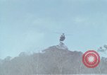 Image of Soldiers struggling to position 105mm Howitzer A Shau Valley Vietnam, 1968, second 42 stock footage video 65675026860