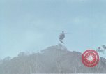 Image of Soldiers struggling to position 105mm Howitzer A Shau Valley Vietnam, 1968, second 43 stock footage video 65675026860
