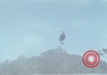 Image of Soldiers struggling to position 105mm Howitzer A Shau Valley Vietnam, 1968, second 44 stock footage video 65675026860