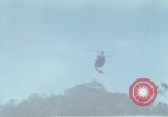 Image of Soldiers struggling to position 105mm Howitzer A Shau Valley Vietnam, 1968, second 45 stock footage video 65675026860