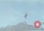 Image of Soldiers struggling to position 105mm Howitzer A Shau Valley Vietnam, 1968, second 46 stock footage video 65675026860