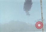 Image of Soldiers struggling to position 105mm Howitzer A Shau Valley Vietnam, 1968, second 49 stock footage video 65675026860