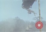 Image of Soldiers struggling to position 105mm Howitzer A Shau Valley Vietnam, 1968, second 53 stock footage video 65675026860