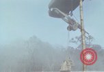 Image of Soldiers struggling to position 105mm Howitzer A Shau Valley Vietnam, 1968, second 55 stock footage video 65675026860