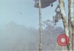 Image of Soldiers struggling to position 105mm Howitzer A Shau Valley Vietnam, 1968, second 58 stock footage video 65675026860