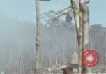 Image of Soldiers struggling to position 105mm Howitzer A Shau Valley Vietnam, 1968, second 61 stock footage video 65675026860