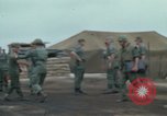 Image of Gen William C Westmoreland in conversation and departure in helicopter A Shau Valley Vietnam, 1968, second 3 stock footage video 65675026863