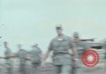 Image of Gen William C Westmoreland in conversation and departure in helicopter A Shau Valley Vietnam, 1968, second 6 stock footage video 65675026863