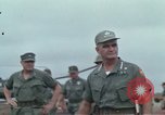 Image of Gen William C Westmoreland in conversation and departure in helicopter A Shau Valley Vietnam, 1968, second 8 stock footage video 65675026863