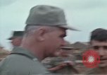 Image of Gen William C Westmoreland in conversation and departure in helicopter A Shau Valley Vietnam, 1968, second 13 stock footage video 65675026863