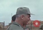 Image of Gen William C Westmoreland in conversation and departure in helicopter A Shau Valley Vietnam, 1968, second 14 stock footage video 65675026863