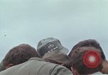 Image of Gen William C Westmoreland in conversation and departure in helicopter A Shau Valley Vietnam, 1968, second 20 stock footage video 65675026863