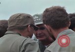 Image of Gen William C Westmoreland in conversation and departure in helicopter A Shau Valley Vietnam, 1968, second 24 stock footage video 65675026863