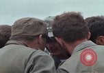 Image of Gen William C Westmoreland in conversation and departure in helicopter A Shau Valley Vietnam, 1968, second 27 stock footage video 65675026863