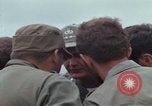 Image of Gen William C Westmoreland in conversation and departure in helicopter A Shau Valley Vietnam, 1968, second 28 stock footage video 65675026863