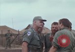 Image of Gen William C Westmoreland in conversation and departure in helicopter A Shau Valley Vietnam, 1968, second 32 stock footage video 65675026863