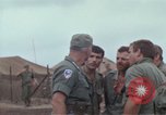 Image of Gen William C Westmoreland in conversation and departure in helicopter A Shau Valley Vietnam, 1968, second 33 stock footage video 65675026863