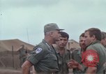 Image of Gen William C Westmoreland in conversation and departure in helicopter A Shau Valley Vietnam, 1968, second 34 stock footage video 65675026863