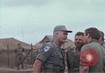 Image of Gen William C Westmoreland in conversation and departure in helicopter A Shau Valley Vietnam, 1968, second 36 stock footage video 65675026863