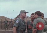 Image of Gen William C Westmoreland in conversation and departure in helicopter A Shau Valley Vietnam, 1968, second 37 stock footage video 65675026863