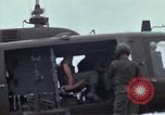 Image of Gen William C Westmoreland in conversation and departure in helicopter A Shau Valley Vietnam, 1968, second 42 stock footage video 65675026863