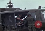 Image of Gen William C Westmoreland in conversation and departure in helicopter A Shau Valley Vietnam, 1968, second 43 stock footage video 65675026863