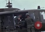 Image of Gen William C Westmoreland in conversation and departure in helicopter A Shau Valley Vietnam, 1968, second 44 stock footage video 65675026863