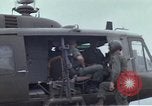 Image of Gen William C Westmoreland in conversation and departure in helicopter A Shau Valley Vietnam, 1968, second 45 stock footage video 65675026863